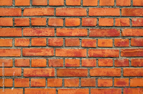 Beautiful decorative wall tiles background material. Red brick wall. Background of old vintage brick wall. Brick wall with red brick, background of red bricks.