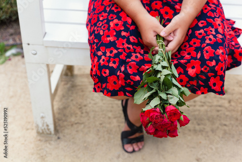 woman holding bouquet of flowers photo