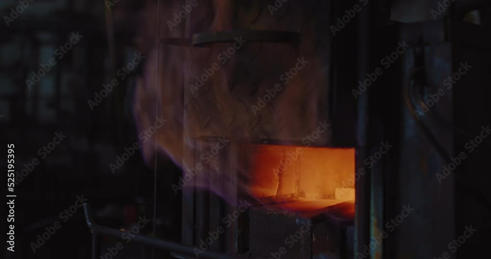 gas furnace in forge workshop, closeup view, flame from oven, metal billets are heating, 4K, Prores gas furnace in forge workshop, closeup view, flame from oven, metal billets are heating, 4K, Prores