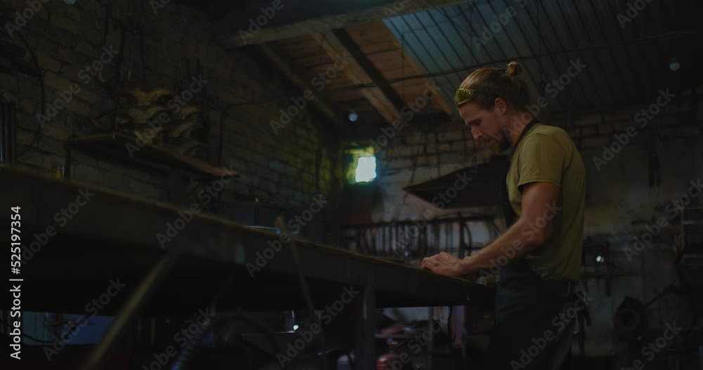 blacksmith is sharpening new handmade knife in forge workshop, hobby and profession, 4K, Prores blacksmith is sharpening new handmade knife in forge workshop, hobby and profession, 4K, Prores
