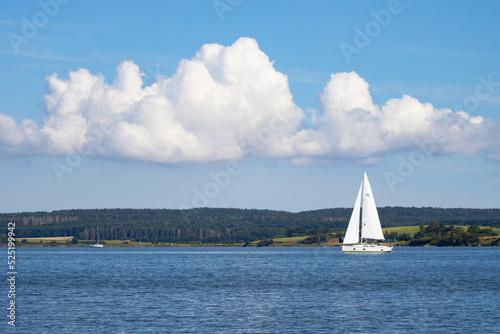 A sailboat in the Baltic Sea Device from the island of Rügen in Germany