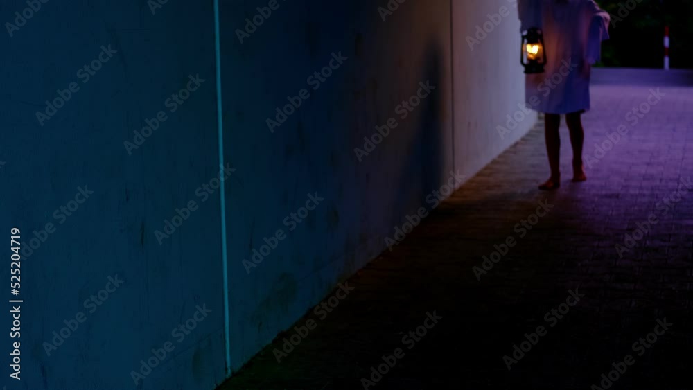 zombie, monster, ghost child 8 years old in white hoodie in creepy tunnel, boy ghost walks at night, halloween concept, frightening mystical events, friday 13th, horror movie scene