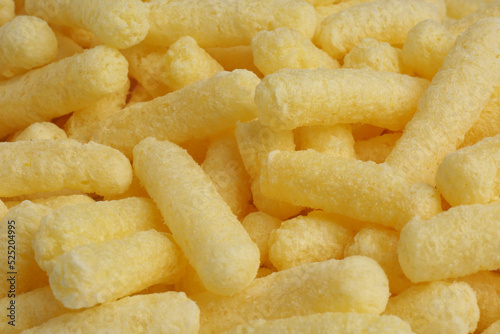 Tasty sweet corn sticks as background, closeup