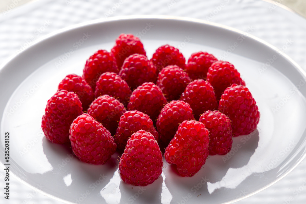 raspberry berries on plate close up macro raspberry berries on plate close up macro