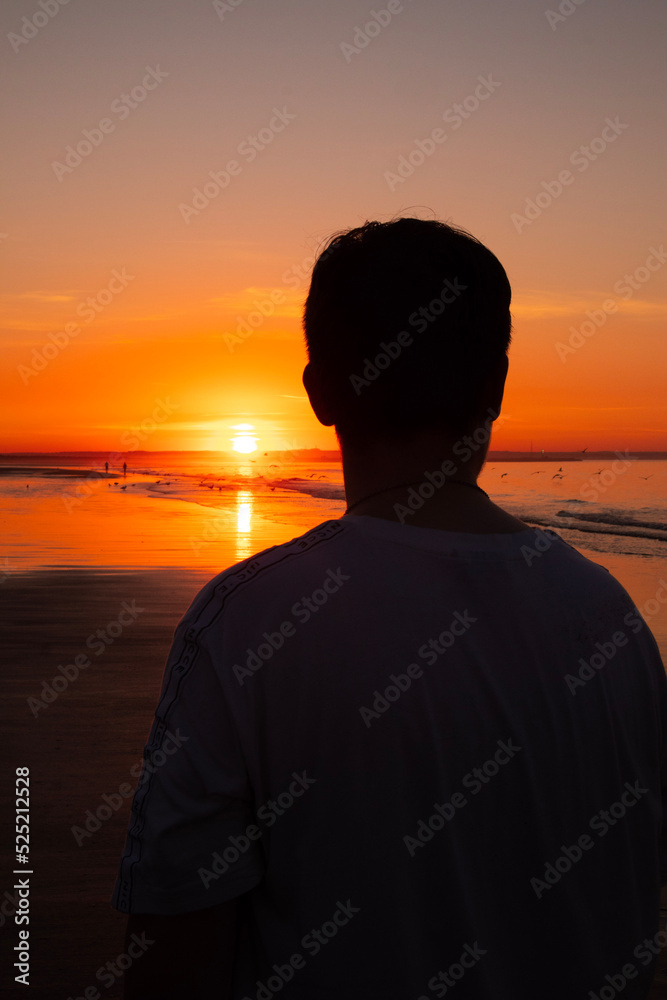 person watching sunset