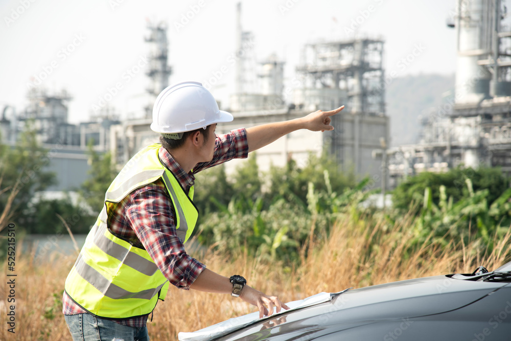 Architect at work in a construction site Engineers man construction safety work concept and construction city .Engineer Concept Architect at work in a construction site Engineers man construction safety work concept and construction city .Engineer Concept
