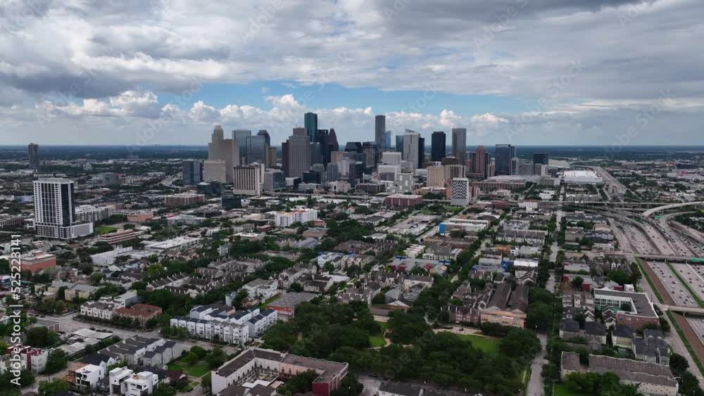 Aerial view towards the Houston city skyline, in cloudy Texas, USA - approaching, drone shot Aerial view towards the Houston city skyline, in cloudy Texas, USA - approaching, drone shot