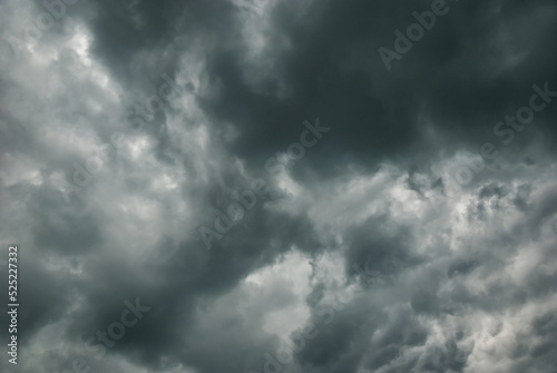 Thunderclouds in stormy sky, dark gray cloudscape before rain