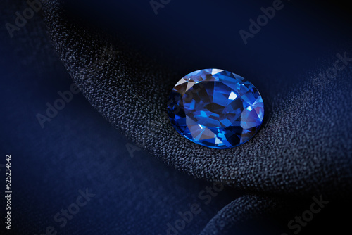 natural blue sapphire on black background