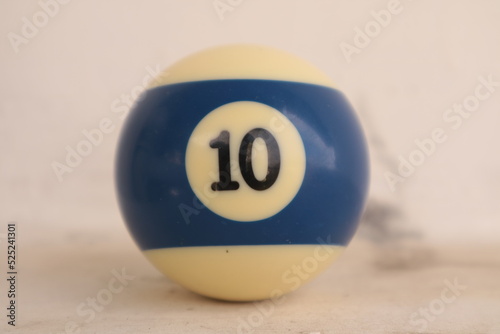 Close-up billiard ball. Billiards sports game on a green table. Active recreation and entertainment.