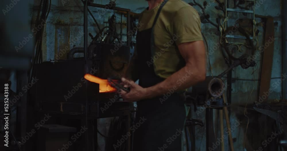 blacksmith is making knife in handmade forge, forging by automatic forging hammer, 4K, Prores blacksmith is making knife in handmade forge, forging by automatic forging hammer, 4K, Prores