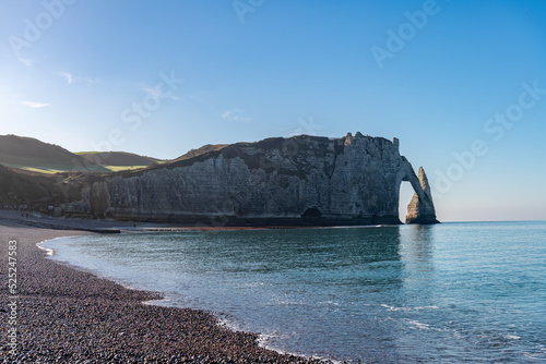 West coast of France. Clifs of Etreta. Rocks on the coast of the English channel strait. Etretat village, Normandy region.