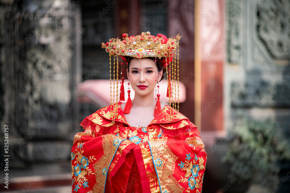 Portrait young beautiful Asian woman wear red cheongsam red
