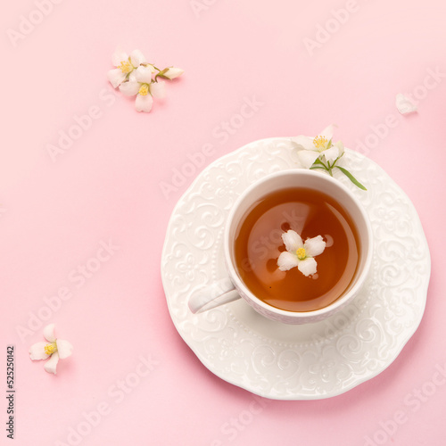 Jasmine tea on color background.