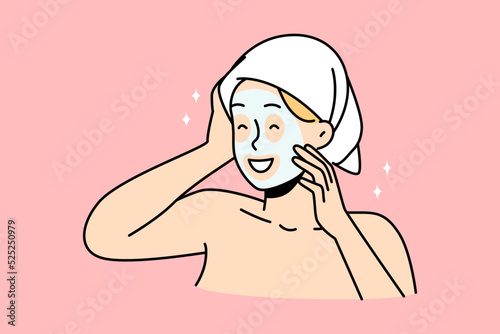 Happy young woman in towel on head and facial mask enjoy beauty procedure. Smiling girl have face skincare routine at home on spa day. Vector illustration. 