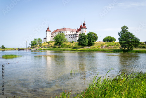 Lacko castle with lake reflection