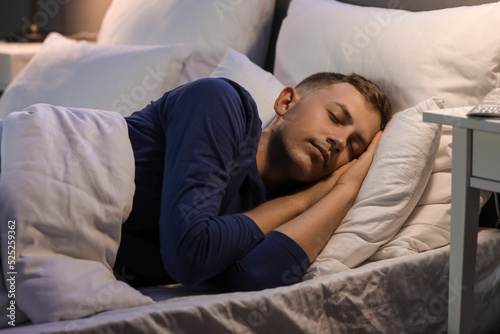Handsome young man sleeping...