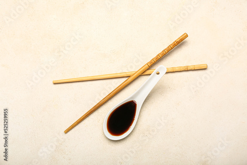 Spoon of soy sauce and chop...