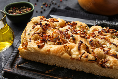 Wooden board with tasty Ita...