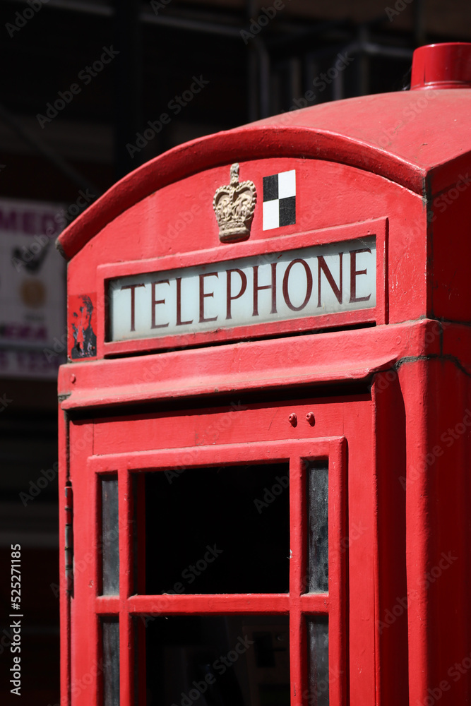 Close-up of a red telephone booth in London Close-up of a red telephone booth in London