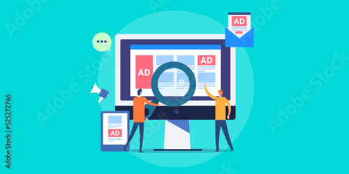 Team of business people working on digital advertising campaign, ad showing on computer and tablet screen, advertising agency concept.