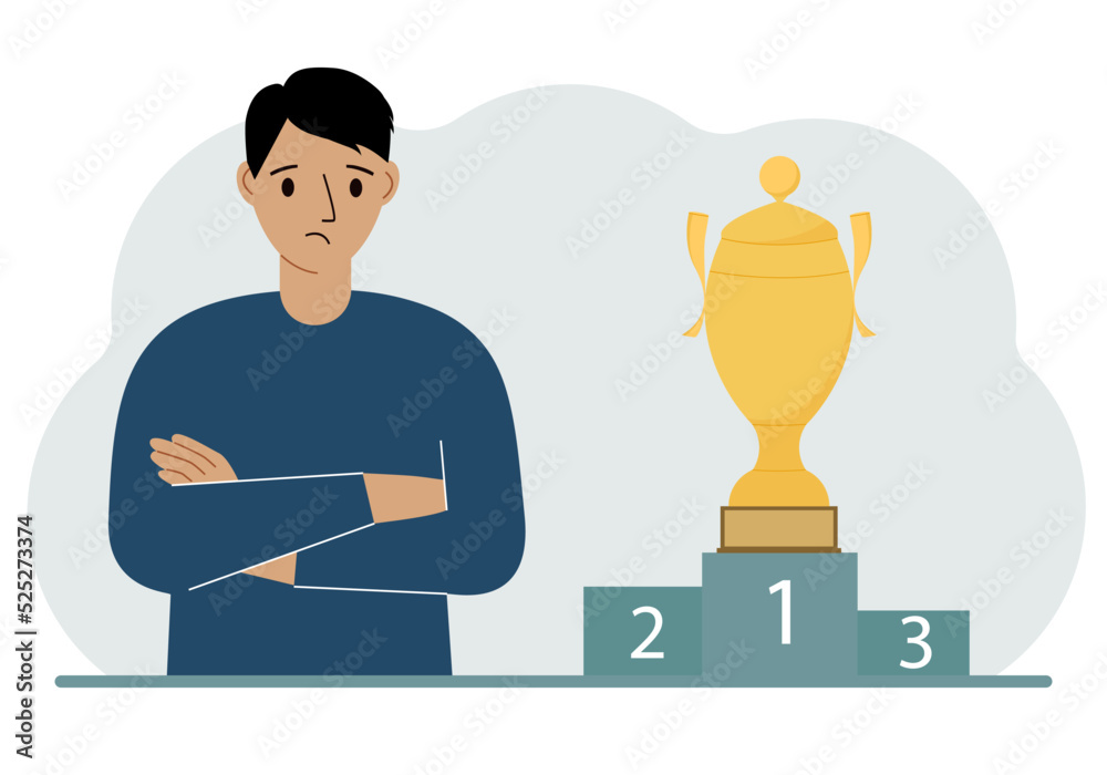 A man next to the pedestal on which the cup for victory and first place. A man next to the pedestal on which the cup for victory and first place.