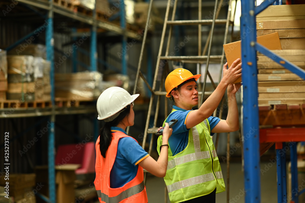 Shot of female managers and male worker checking inventory and quantity of storage product on shelf in n a large warehouse Shot of female managers and male worker checking inventory and quantity of storage product on shelf in n a large warehouse