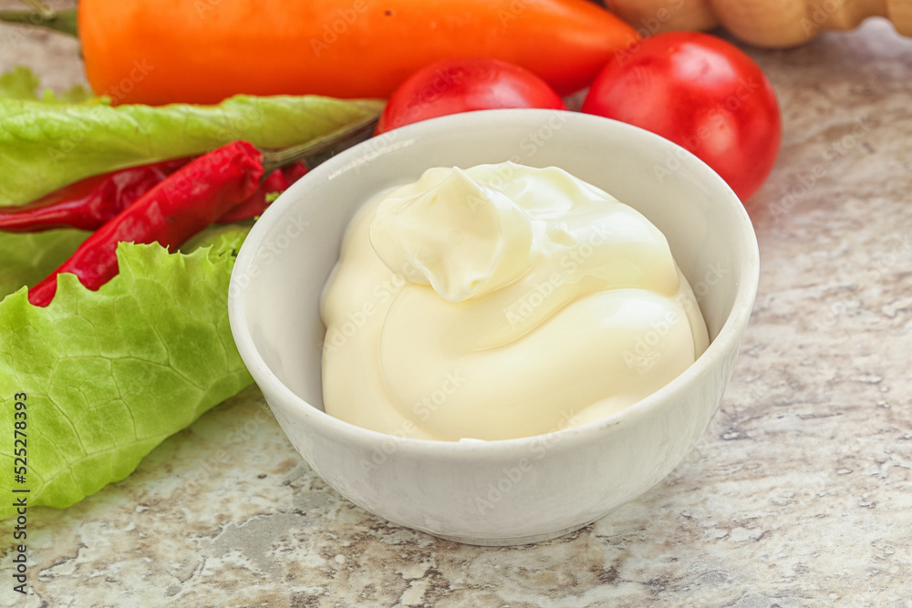 Organic mayonnaise sauce in the bowl Organic mayonnaise sauce in the bowl
