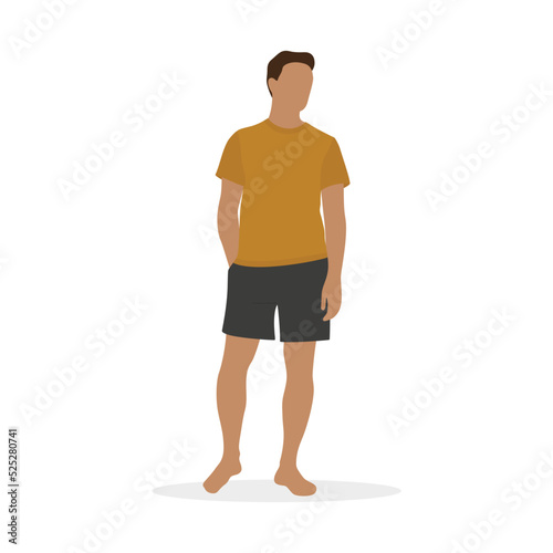 A man in pajamas and barefoot stands on a white background