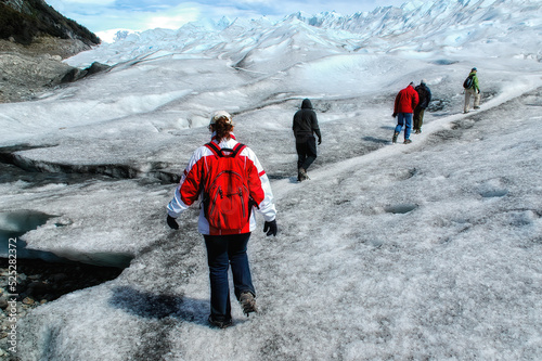 Tourists trekking on Perito Moreno Glacier