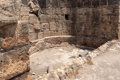 Partially restored ruins of one of the cities of the Decapolis - the ancient Hellenistic city of Scythopolis near Beit Shean city in northern Israel #525282590