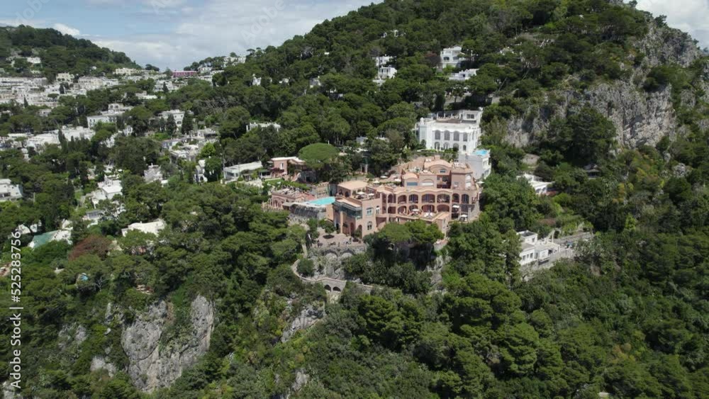 Luxury Italian Hotel on Cliff Coastline of Capri Island, Aerial Orbit Luxury Italian Hotel on Cliff Coastline of Capri Island, Aerial Orbit