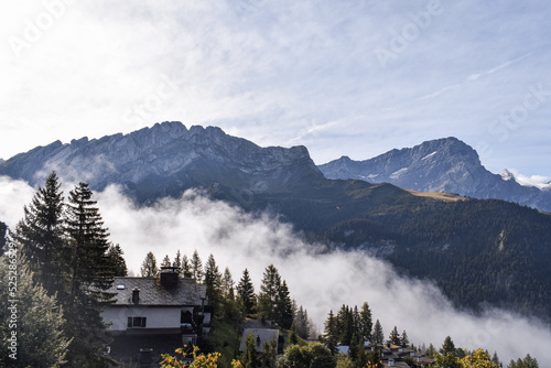 View over the mountains in Gryon, Switzerland photo