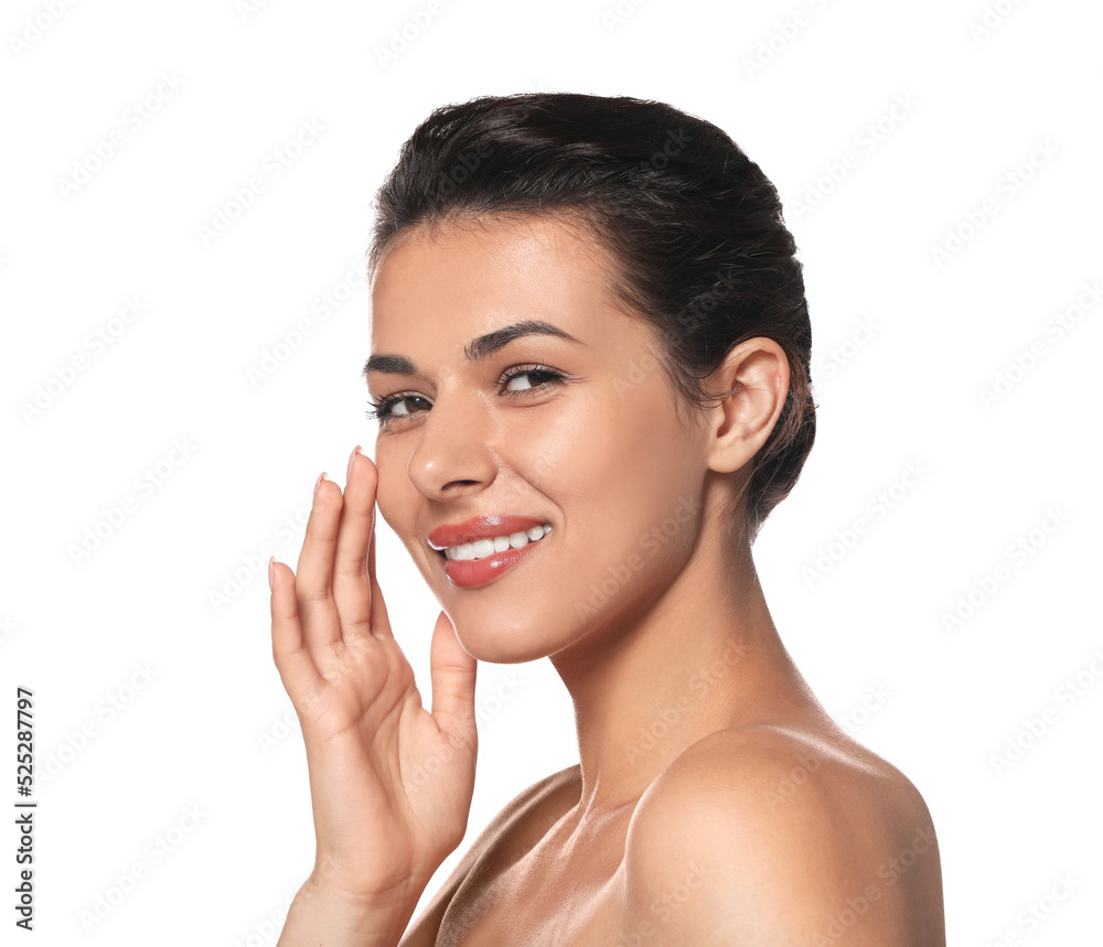 Woman applying cream under eyes on white background. Skin care