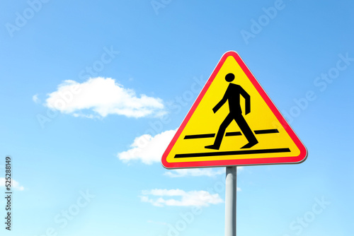 Traffic sign Pedestrian Crossing Ahead against blue sky, space for text