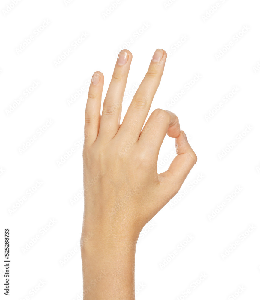Woman showing okay gesture on white background, closeup of hand Woman showing okay gesture on white background, closeup of hand