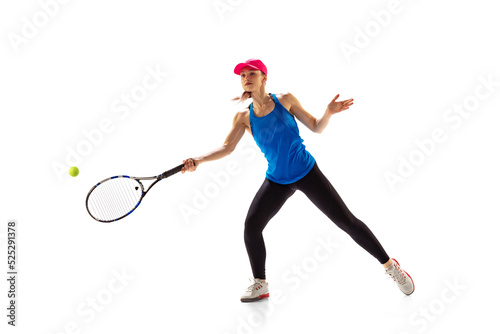 Young sportive woman, tennis player playing tennis isolated on white background. Healthy lifestyle, fitness, sport, exercise concept. © master1305