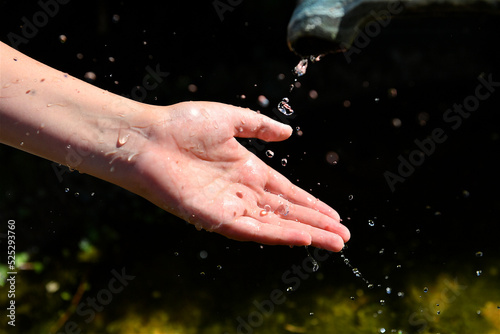 hand and water