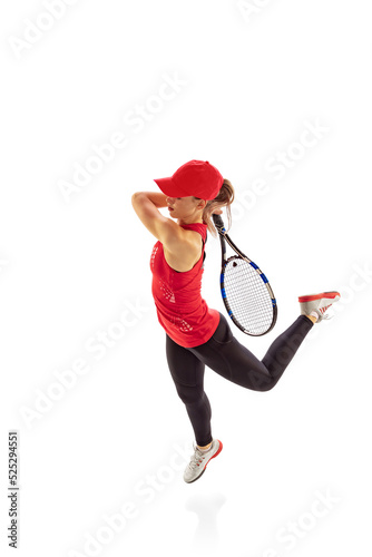 Portrait of sportive woman, tennis player playing tennis isolated on white background. Healthy lifestyle, fitness, sport, exercise concept. © master1305