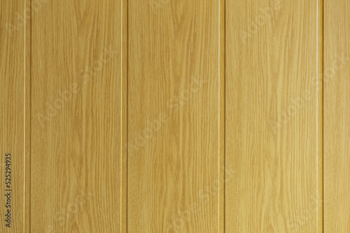 Wood colored plastic wall panel