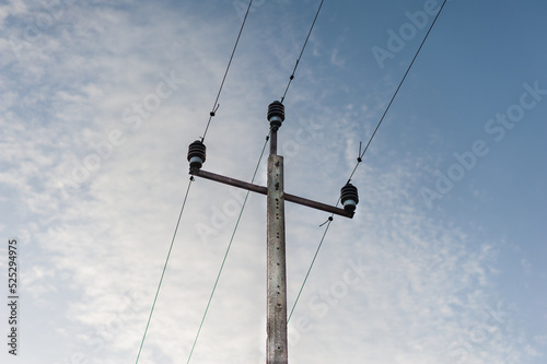 Old electric pole with sky