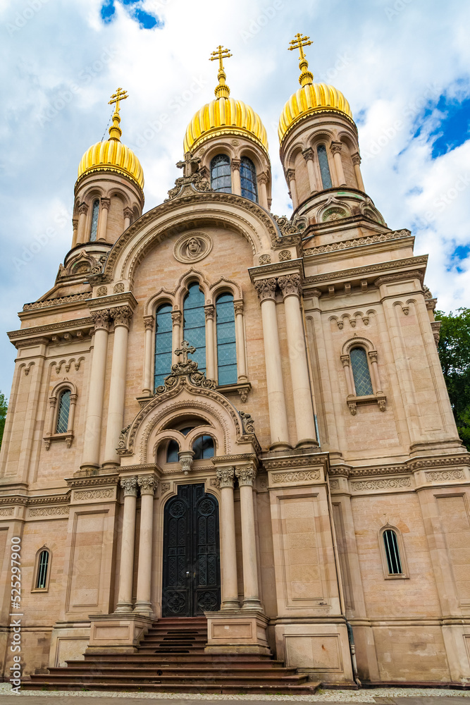 Nice close-up view of the west entrance of the famous Russian Orthodox Church of Saint Elizabeth, also called Greek Chapel, with its five gilded onion domes on the hill Neroberg in Wiesbaden, Germany.