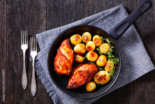 grilled chicken breasts with browned new potatoes