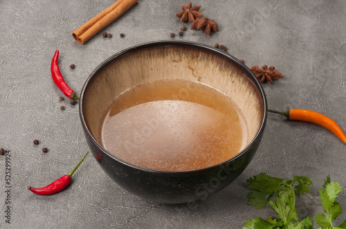 Fotografiet Asian broth is the basis of many delicious popular soups
