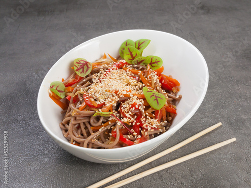 buckwheat noodles soba with vegetables. concept vegetarian dish photo