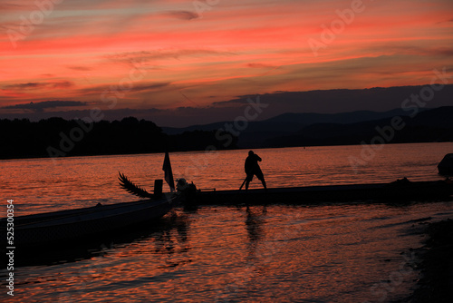 Boat on the Danube river in Hungary during sunset.Summer season. © Munka