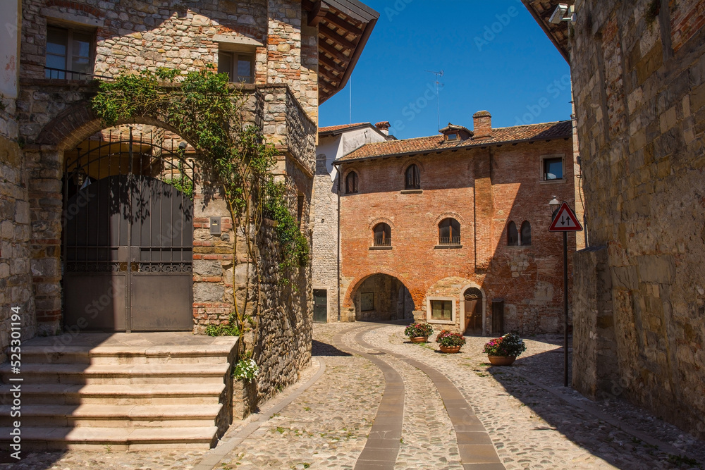 A quiet back street in the historic medieval centre of Cividale del Friuli, Udine Province, Friuli-Venezia Giulia, north east Italy
