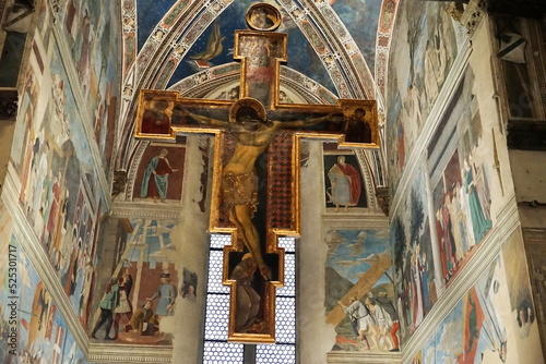 Crucifix and frescoes inside the basilica of San Francesco in Arezzo, Tuscany, Italy