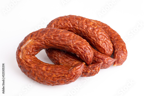 Traditional smoked sausage, isolated, close-up. Polish meat sausage, a packshot photo for package design. 