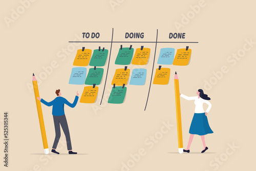 Review work progress on kanban board, todo list, in progress task and finished one, project management or planning for production concept, business people review project progress on kanban board. photo